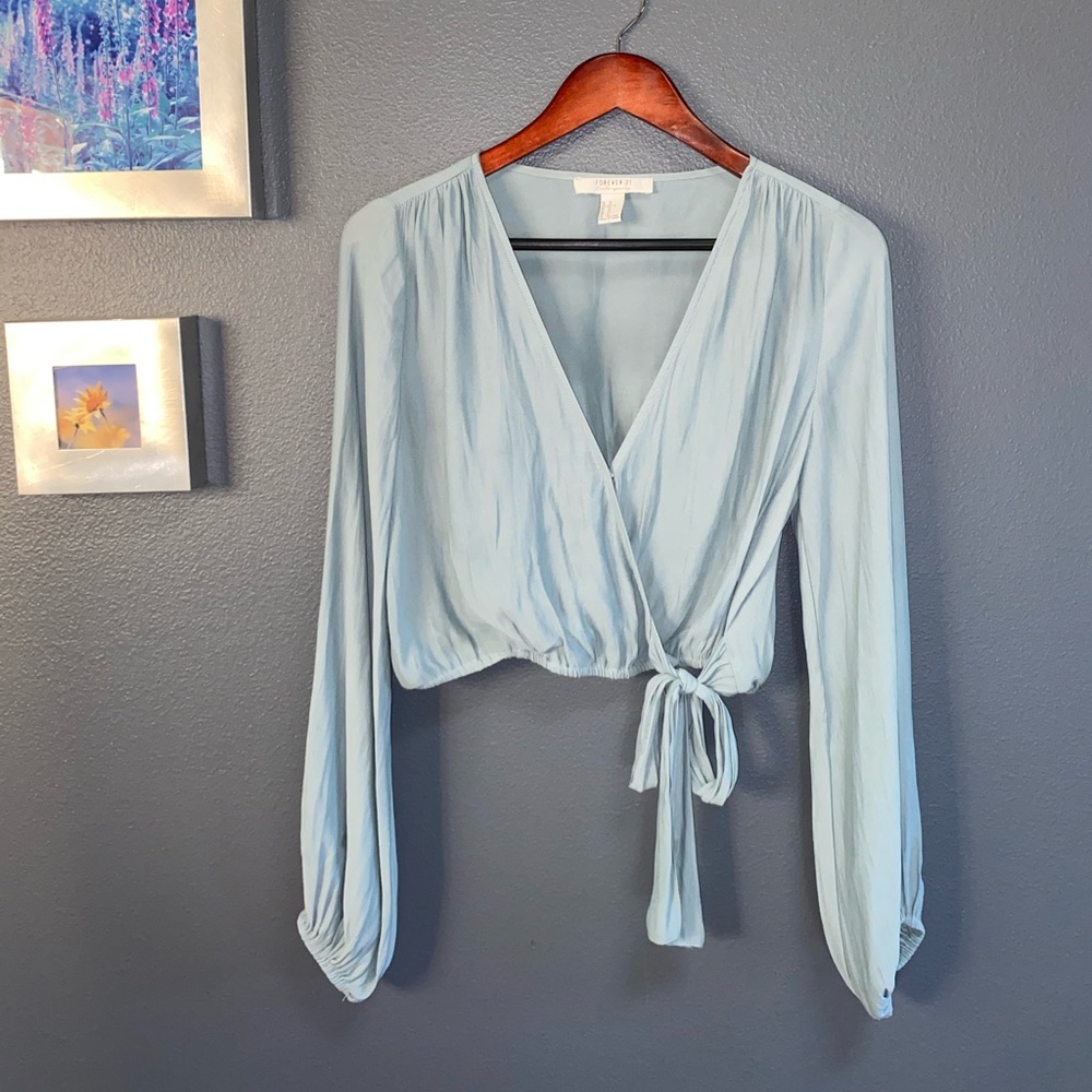 Semi-sheer, loose-fitting, deep neck, crop